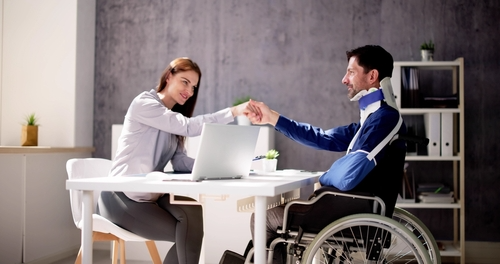Injured Florida resident meeting with personal injury lawyer to discuss case