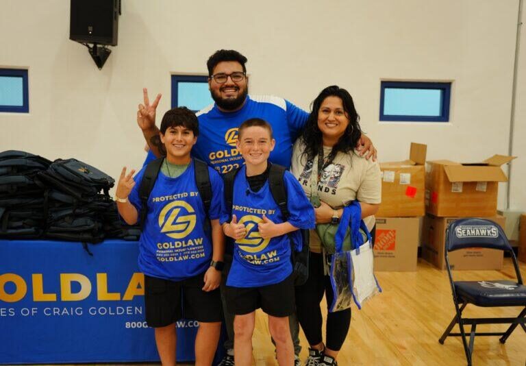 GOLDLAW’s 2nd Annual Back to School Bash Provides 700+ Backpacks to Local Students